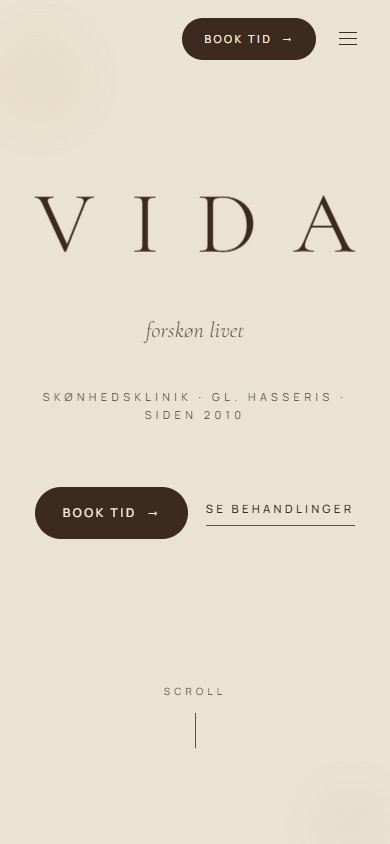 VIDA Skønhedskliniks hjemmeside på en telefon
